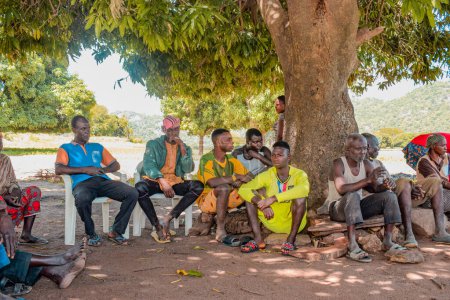 Photo for Abuja Nigeria - July 26, 2021: Community Sensitization on Covid 19, Health and Water Hygiene of Indigenous Africa Villages. Election Campaign Meeting. Cancer Awareness Program and Empowerment - Royalty Free Image