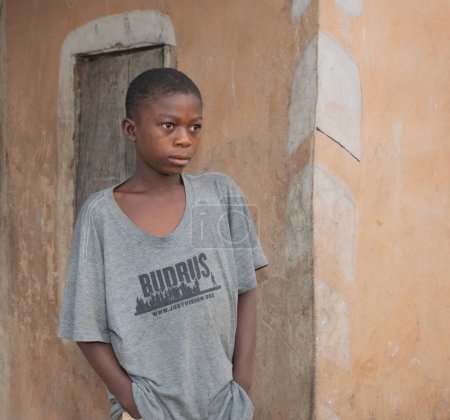 Photo for Opialu, Benue State - March 6, 2021: African Child Looking Worried - Royalty Free Image