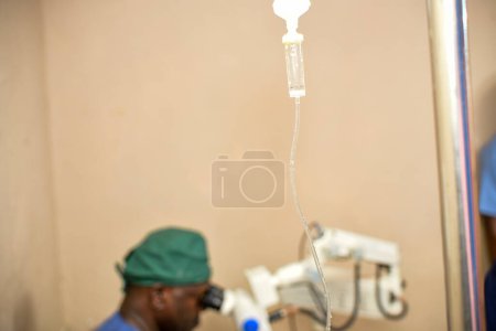 Photo for Jos, Plateau State - May 5, 2021: African Surgeon in a Medical Theatre Getting Ready for an Emergency Session. Doctor on Scrubs - Royalty Free Image