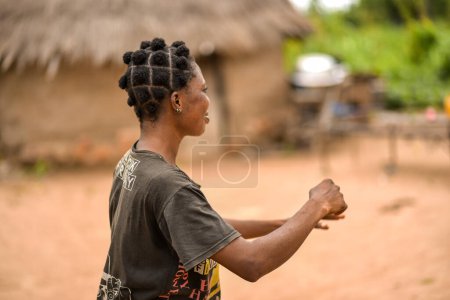 Photo for Abuja Nigeria - June 20, 2023: African Woman with Plated Hair - Royalty Free Image