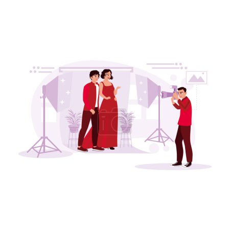 Illustration for Young male photographer photographing a couple in a photo studio. Trend Modern vector flat illustration. - Royalty Free Image