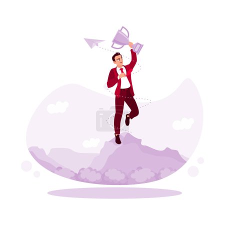 Illustration for The young businessman is holding a trophy and standing on the mountain. Concept of victory, success, and target goals. Trend Modern vector flat illustration. - Royalty Free Image