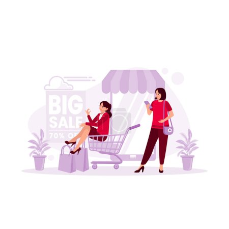 Ilustración de Una mujer se sienta en un carrito de compras. La mujer detrás de ella está de compras en línea a través del teléfono celular. Gran concepto de venta. Tendencia Moderno vector ilustración plana - Imagen libre de derechos