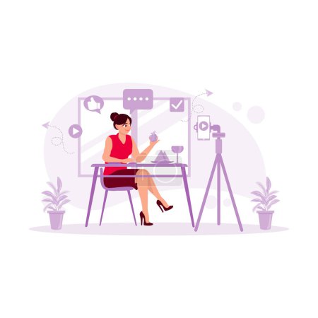 Illustration for Young female blogger using a mobile phone to record fruit and healthy food. Blogger concept. trend modern vector flat illustration - Royalty Free Image