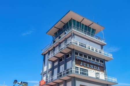 Photo for The old disused Juanda International Airport Air Traffic Control Tower against the backdrop of a clear blue sky, Sidoarjo, 29 July 2023. - Royalty Free Image