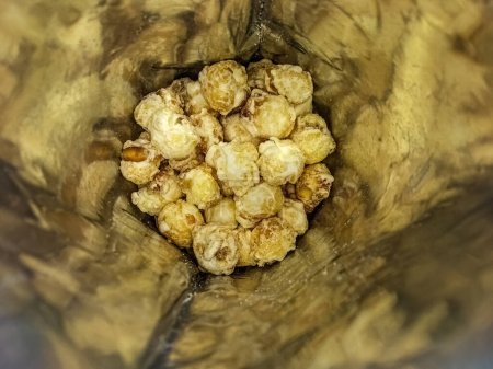 Cheese flavored popcorn in plastic packaging