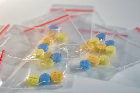a collection of medication for schizophrenia in a plastic clip