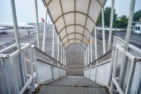 passenger boarding stair for aircraft at the airport