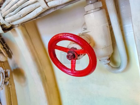 red valve on the interior of the submarine