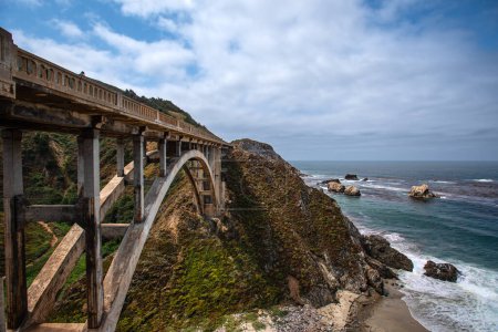 Photo for Side View of the Rocky Creek Bridge by the Pacific Ocean - Big Sur, California - Royalty Free Image