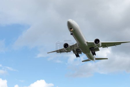 Photo for Vehicles against the background of the sky with a landing gear .Traveling on a large plane - Royalty Free Image