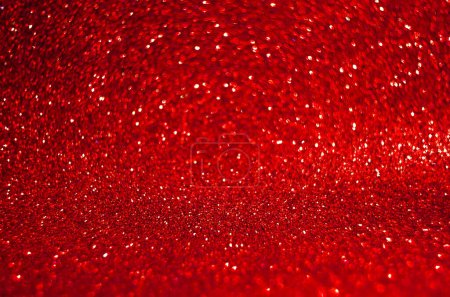 Abstract red background, bokeh glitter backdrop .Romantic backdrop for Christmas, Valentines day, holiday or event. Circle blurred bokeh.