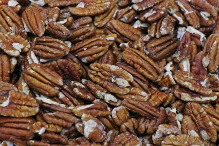 Photo for Close up of healthy delicious pecan nuts for energy and healthy living - Royalty Free Image
