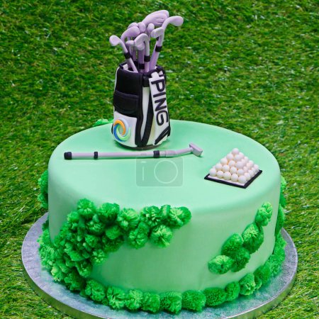Photo for Dubai, United Arab Emirates - August 24, 2020 Designed birthday cake on a green grass background, Golf theme - Royalty Free Image