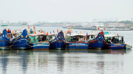 Photo for Kerala, India- March 25, 2023 fishing boats halted in fort kochi boat yard during trawling ban in kerala - Royalty Free Image