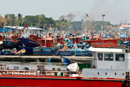 Photo for Kerala, India- March 25, 2023 fishing boats halted in fort kochi boat yard during trawling ban in kerala - Royalty Free Image