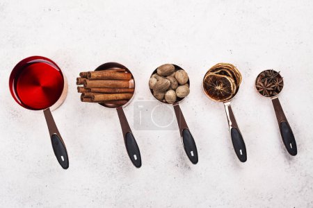 Photo for Hot mulled wine ingredients. Autumn or winter warm drink preparation. Top view. Copy space - Royalty Free Image