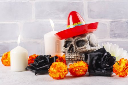 Photo for Dia De Los Muertos background. Skull, marigold flowers, burning candles. Traditional Dead of the Dead altar. Copy space - Royalty Free Image