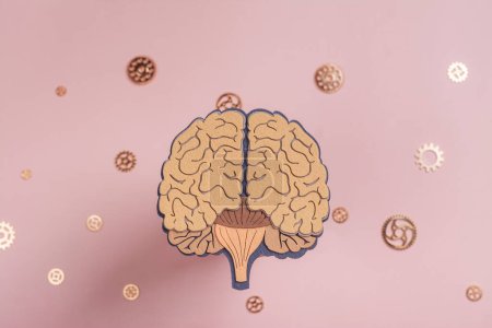 Photo for World mental health day, October 10 th. Brain with gears on pink background - Royalty Free Image
