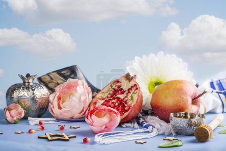 Photo for Honey, pomegranates, apples and flowers. Rosh Hashanah - Jewish New Year background. Copy space - Royalty Free Image