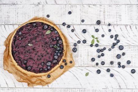 Photo for Traditional finnish blueberry pie. National blueberry day - july 8. Top view. Copy space - Royalty Free Image