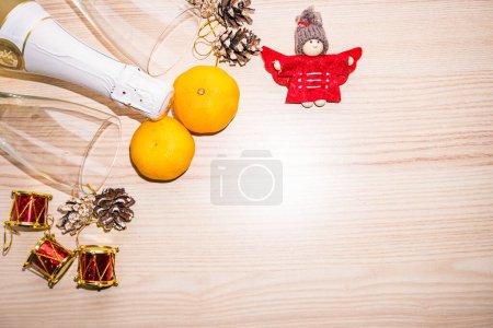 Photo for New year background with toy, Champagne and tangerines. Christmas Celebration. High quality photo - Royalty Free Image