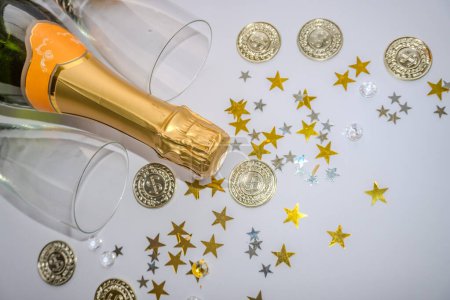 Photo for New year background with Champagne and Coins and stars. Christmas Celebration. High quality photo - Royalty Free Image