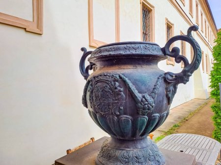 Vintage beautiful bronze vase in the park for Wallenstein Park was created in 1625-1626. by the Dutch sculptor Adriaan de Vries in Prague, Czech. High quality photo