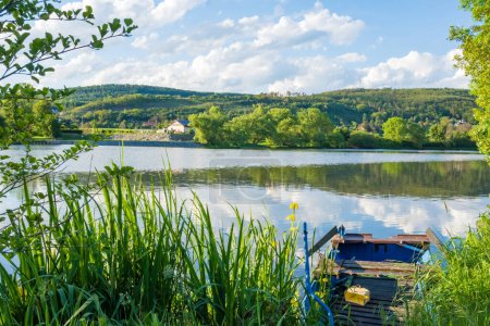 Beautiful views of the river Berounka a Wooden boats in the spring season. Czech. High quality photo
