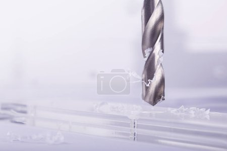 Foto de Broca hacer agujeros en plástico opacidad, palanquilla de vidrio - Imagen libre de derechos