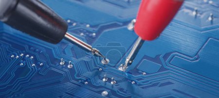 Photo for Measuring electronic signal from component on the PCB. Electronics repair and digital technology. - Royalty Free Image
