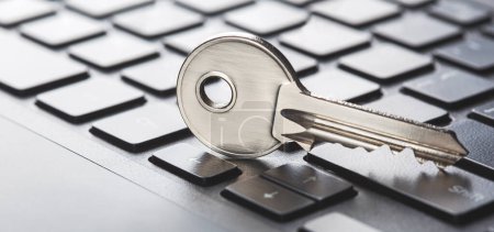 Phishing, Hacken persönlicher Daten und Geld, Schlüssel und Haken auf der Computertastatur.