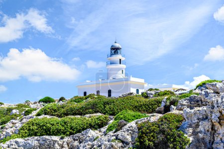Photo for Cavalleria lighthouse located in Cabo de Cavalleria of Menorca, Balearic Islands, Spain - Royalty Free Image