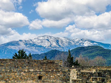 Photo for Forest landscape with snowy mountain and blue sky with white clouds from the town of Ainsa, Sobrarbe, Huesca - Royalty Free Image