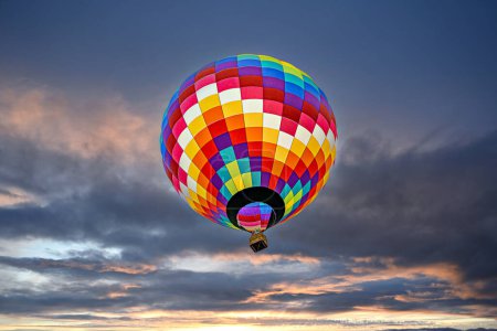 Photo for Colorful hot air balloon flying at sunset - Royalty Free Image