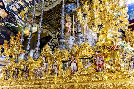 Photo for Malaga, Andalusia, Spain; April 4, 2023: Holy Week, passage of the Virgin Mary Santsima de la Esperanza in the Basilica-Casa Hermandad del Paso de La Esperanza - Royalty Free Image
