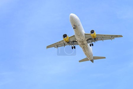 Photo for Barcelona, Spain; April 10, 2023: Vueling Airbus A320 plane, landing at Josep Tarradellas Barcelona-El Prat airport - Royalty Free Image