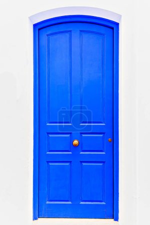 Photo for Typical white house with blue door in the beautiful city of Mojacar, Almera, Andalusia - Royalty Free Image