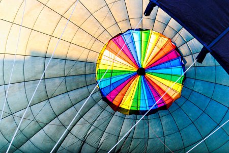 Interior of colorful hot air balloon filling with hot air