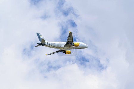 Barcelona, Spain; May 18, 2024: Airbus A319 plane of the Vueling airline, taking off from the Josep Tarradellas airport in Barcelona-El Prat.