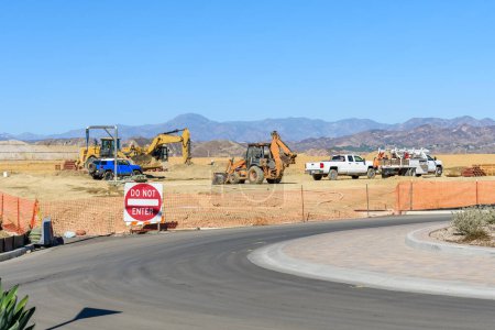 Photo for Land being levelled in a housing development on a sunny autumn day. Santa Clarita, CA, USA. - Royalty Free Image