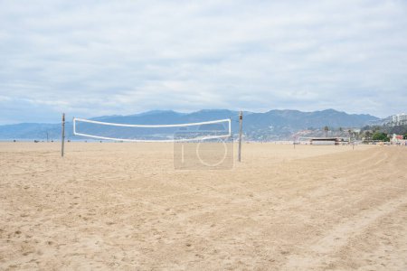 Photo for Volleyball nets on a sand beach in autumn. Santa Monica, CA, USA. - Royalty Free Image