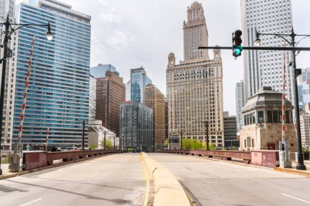 Photo for Deserted street over a bridge in downtown Chicago on a sunny spring day - Royalty Free Image