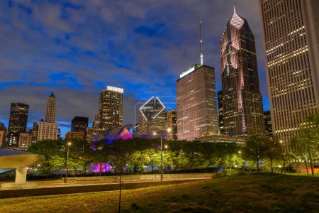 Photo for View of Chicago skyline from Millennium park at twilight in spring. Chicago, IL, USA. - Royalty Free Image
