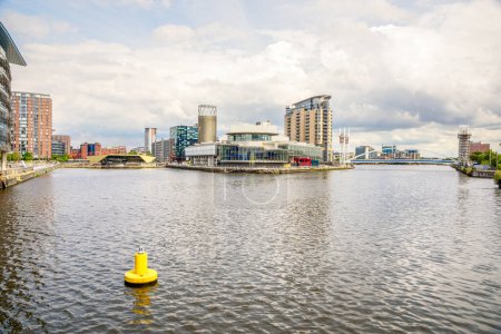 View of Salford quays in Manchester on a cloudy summer day. England, UK.