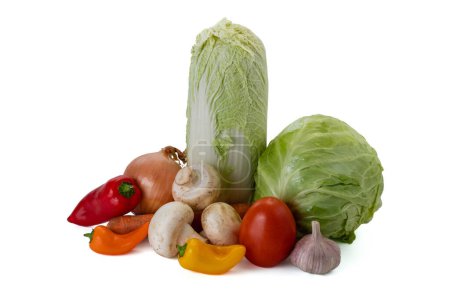 Fresh vegetables still life. Isolated on white background. High quality photo