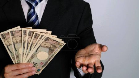 Photo for Businessman posing with money - Royalty Free Image