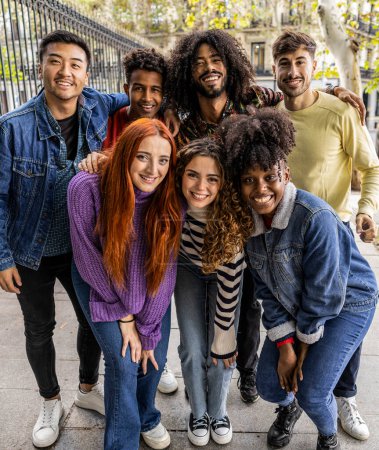 Photo for Multiracial young group of happy people taking selfie portraits - Diverse millennial friends laughing and having fun together, city travelers, students. - Royalty Free Image