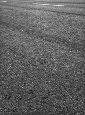 Blanco y negro. Retrato de textura de asfalto en una carretera importante en el distrito de Kepahiang, Bengkulu, Indonesia