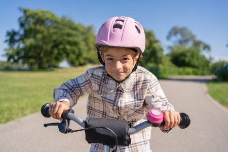 Photo for Excited father teaching girl to ride a bike, summer fun and park outdoors. Happy kid, learning and riding bicycle with help from dad, parent and safety for healthy development. - Royalty Free Image